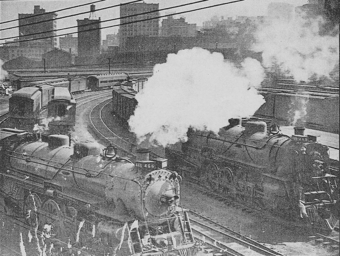 Locomotives headed into Terminal Station, in the Gulch